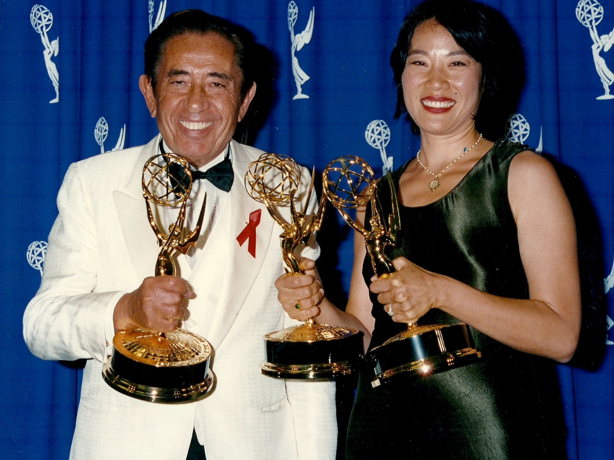 Janet Yang, right, and Abby Mann, executive producers of the 1996 HBO film 'Indictment: The McMartin Trial,' celebrate its Golden Globe for Best Miniseries or Television Film.