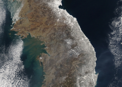 February 15, 2011 09/14/2009 Satellite view of snowfall along South Korea's east coast. East of Seoul, clusters of small white clouds cast shadows onto the surface below, but most of the white on the peninsula is snow.