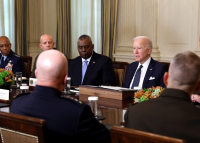 U.S. President Joe Biden gives remarks before the start of a meeting with leaders from the Department of Defense in the State Dining Room of the White House on October 26, 2022 in Washington, DC. Biden spoke on a range of topics including his new appointments to the heads U.S. Military branches and his hope that the military reflects the population of the United States. Biden was joined by Defense Secretary Lloyd Austin (fourth from left) and Chairman of the Joint Chiefs of Staff General Mark Milley (R).